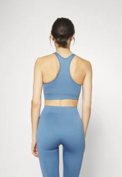 Light Support Sports Bra - Blue -Chic Mode Shop e9e5c360dd5245d49caa79d050d88268